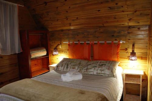 Una cama o camas en una habitación de Recanto da Mata Pousada