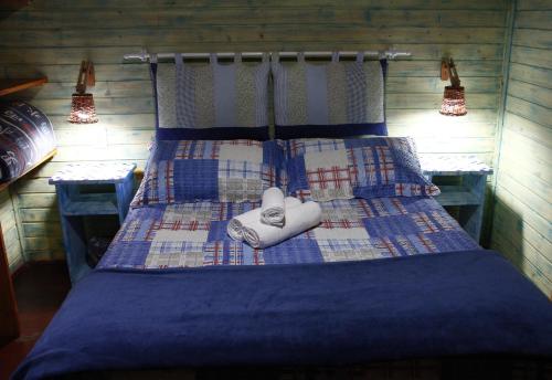 Una cama o camas en una habitación de Recanto da Mata Pousada