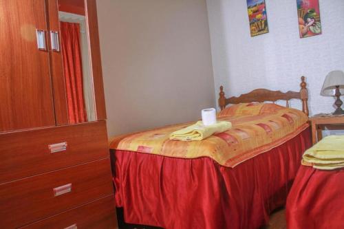 Un ou plusieurs lits dans un hébergement de l'établissement Hotel Virgen del Carmen - Huaraz