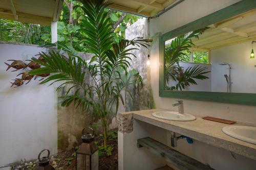 A bathroom at Mi Lugar Maldives