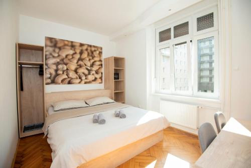 Postel nebo postele na pokoji v ubytování Viva Rooms