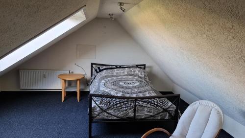 Säng eller sängar i ett rum på Dörrebach bei Bingen am Rhein und Start zum Soonwald;Hunsrück