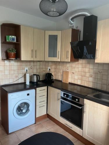 Η κουζίνα ή μικρή κουζίνα στο Apartament Podłęska