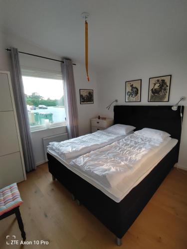 Llit o llits en una habitació de Fristående Bungalow