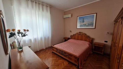 Postel nebo postele na pokoji v ubytování Appartamento BERIMBAU vicino Malpensa