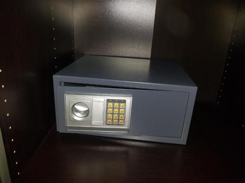 a microwave oven sitting on top of a table at Glyfada Beach Hotel in Glyfada