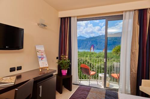a hotel room with a view of a balcony at Hotel Europa in Malcesine