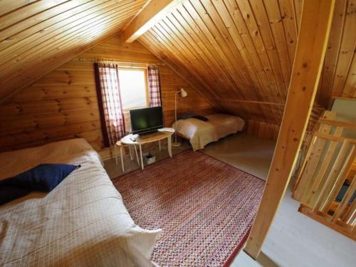 Un pat sau paturi într-o cameră la Kämmekkä