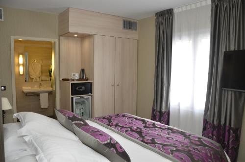 Cama o camas de una habitación en Best Western Plus Richelieu