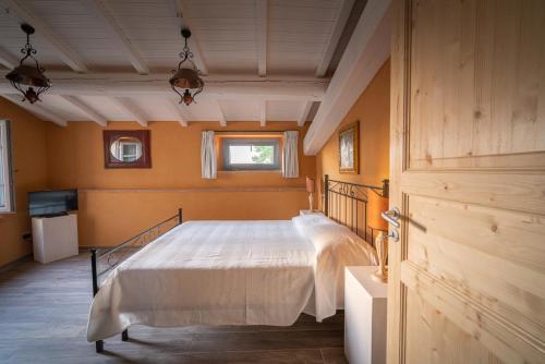 En eller flere senge i et værelse på Il Mulino