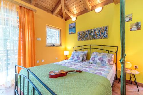 Un pat sau paturi într-o cameră la Apartments Barica