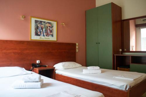 Voodi või voodid majutusasutuse Egnatia Hotel toas