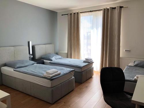 Cama o camas de una habitación en Pension Lara
