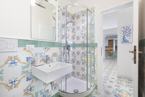 a bathroom with a sink and a shower at Estate4Home - Casa Maridea in Sorrento