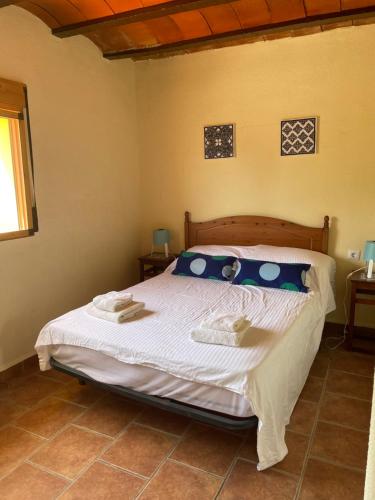A bed or beds in a room at Air Conditioned "Casa Tropicana" Entire Villa or Individual Apartments