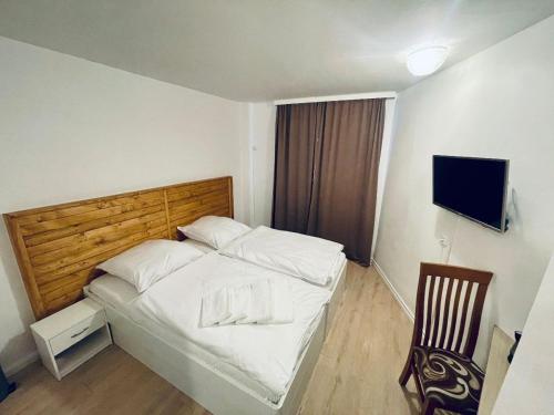 Säng eller sängar i ett rum på Hotel Sankt Lorenz