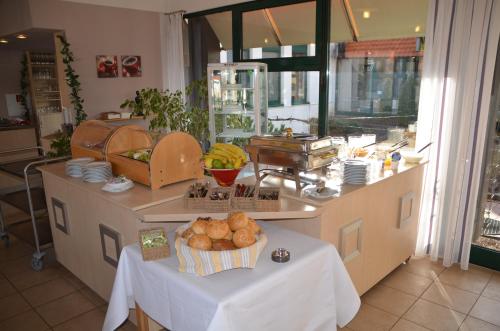 a kitchen with a table with a bowl of food on it at velcrea in Willebadessen