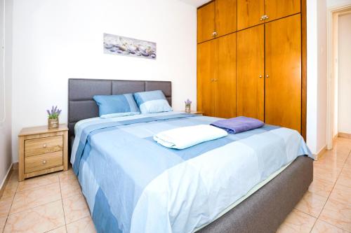 Postel nebo postele na pokoji v ubytování MyNapa Apartments