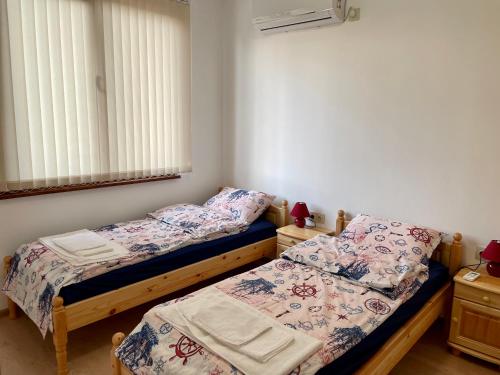 Postel nebo postele na pokoji v ubytování Къщи за гости “Планински Рай” Mountain Paradise