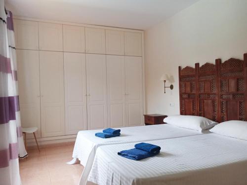 Postel nebo postele na pokoji v ubytování Villa Oasis II