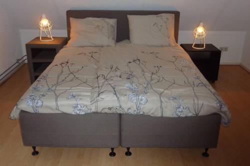 Säng eller sängar i ett rum på Sfeervolle villa in Gasselte Drenthe bij Hemelriek