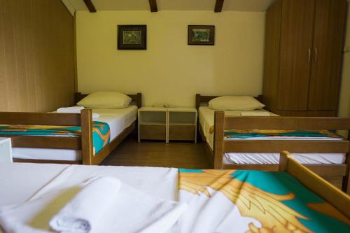 Ліжко або ліжка в номері Villa Una Dvoslap
