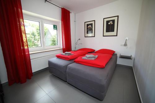En eller flere senge i et værelse på Landhaus Silbach