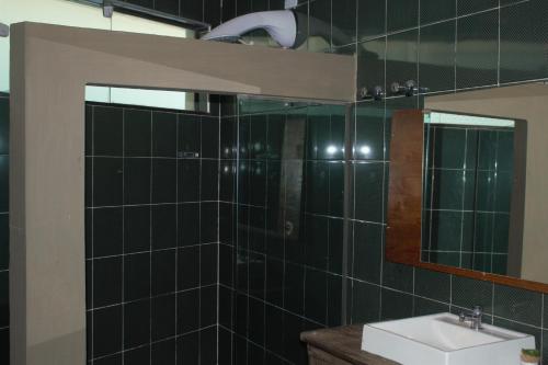 Kúpeľňa v ubytovaní Curvão Surf House
