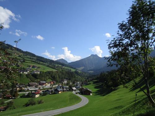 a small village in the mountains with a road at Ferienhaus Englbrecht in Krispl