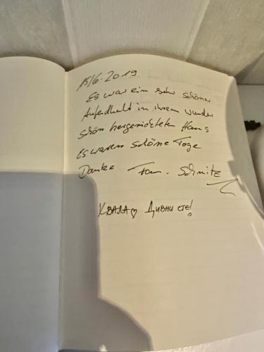 a piece of paper with handwriting on the side of a refrigerator at Gästehaus Ehringhausen 63 (Anno 1719) in Remscheid