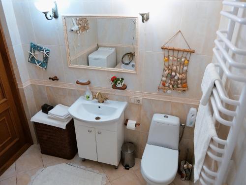Ванна кімната в Sadyba Pochayiv