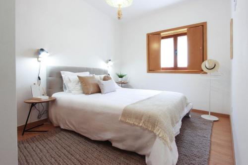 Ένα ή περισσότερα κρεβάτια σε δωμάτιο στο Casa do Condado