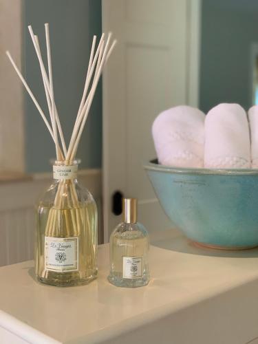 two bottles of soap and a bowl on a counter at The Pebble Bed and Breakfast in Halifax
