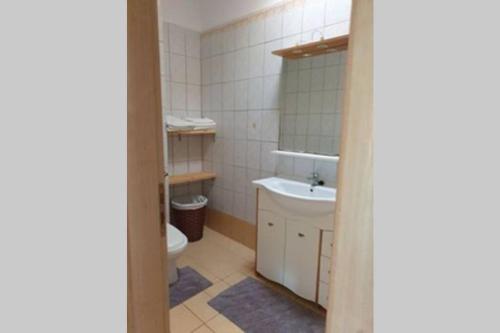 a bathroom with a toilet and a sink at Rhodes:Private house for holiday in Rhodes Town