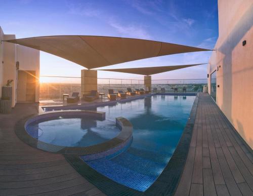 The swimming pool at or close to Boulevard Hotel Oman