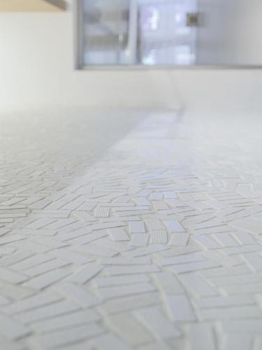 an empty room with a white tile floor at Dreamers Sea View in Manarola