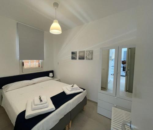 Posteľ alebo postele v izbe v ubytovaní Petals casa vacanze