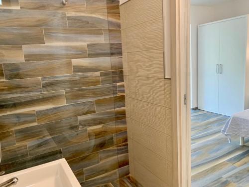 a bathroom with a toilet and a sink at Camping Village Baia Falcone in Vieste