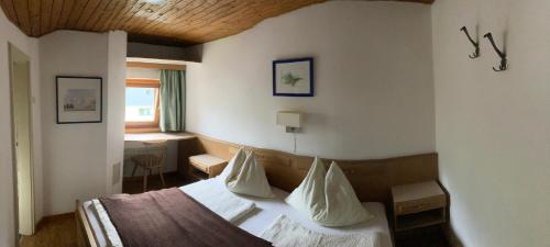 Postel nebo postele na pokoji v ubytování Garni Guflhof