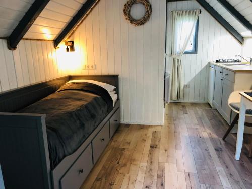 Ein Bett oder Betten in einem Zimmer der Unterkunft Ferienhaus Vogelkoje