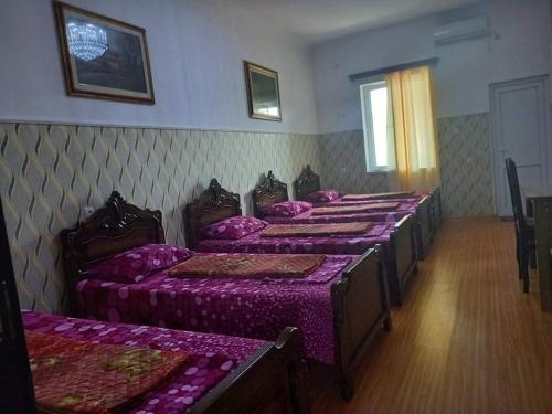 Postel nebo postele na pokoji v ubytování Guest House Fazisi