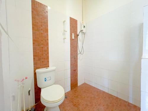 a bathroom with a toilet and a shower at The Endless Bangtao Residence TV2 AND TV 3 in Bang Tao Beach