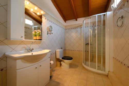 Kúpeľňa v ubytovaní Grand Villa Roubana