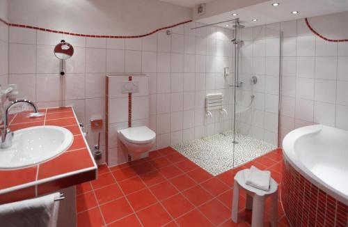 Vonios kambarys apgyvendinimo įstaigoje Ringhotel Posthotel Usseln
