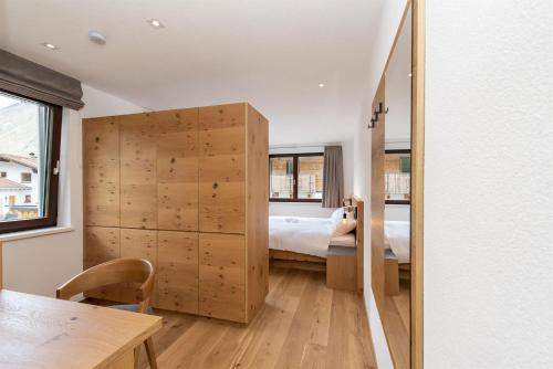 Katil atau katil-katil dalam bilik di Chalet Vega - Arlberg Holiday Home