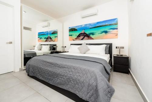 Postel nebo postele na pokoji v ubytování Ducassi Premium Suites