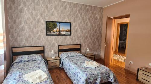Postel nebo postele na pokoji v ubytování B&B Regina