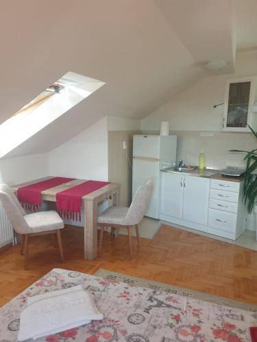 Kuchyň nebo kuchyňský kout v ubytování Apartment Loft