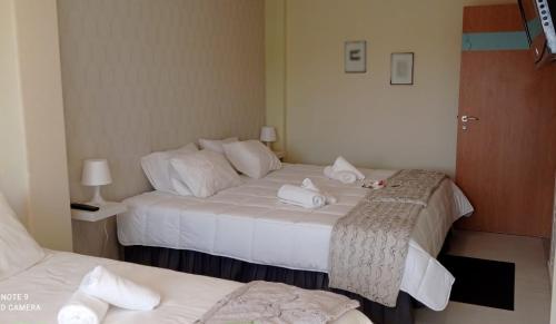 Ένα ή περισσότερα κρεβάτια σε δωμάτιο στο Liber Guest House