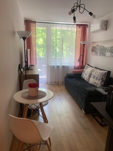 Posedenie v ubytovaní SEN na CICHEJ - Apartamenty w PARKU